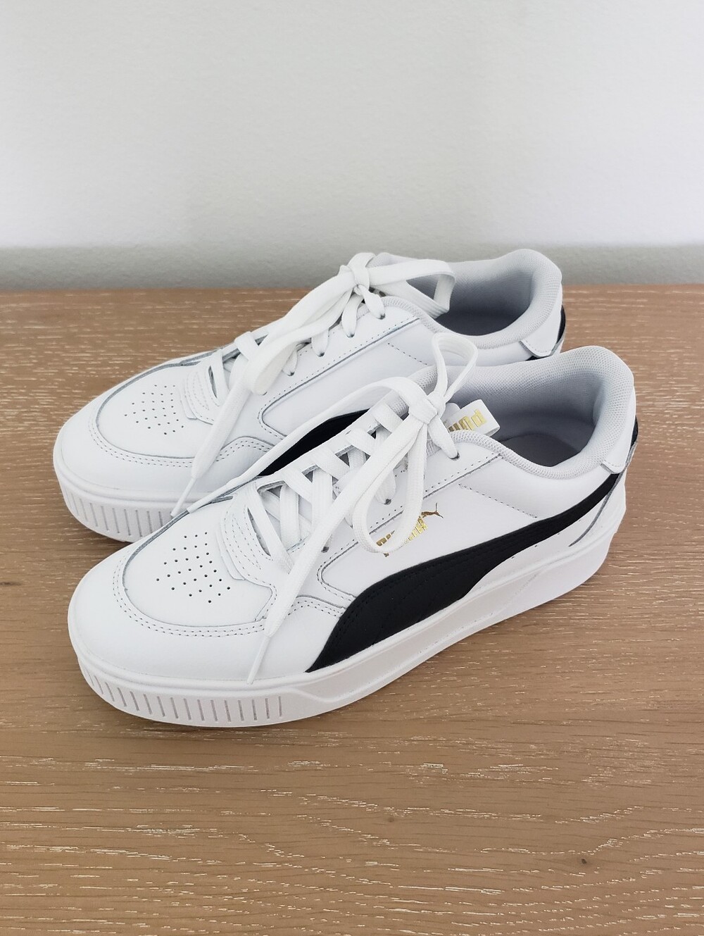 Women's Puma White Sneakers with Black Formstrip